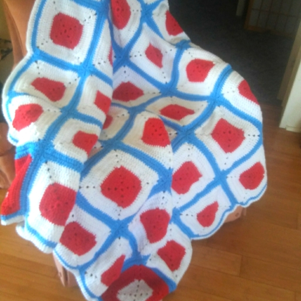 Crocheted acrylic afghan.